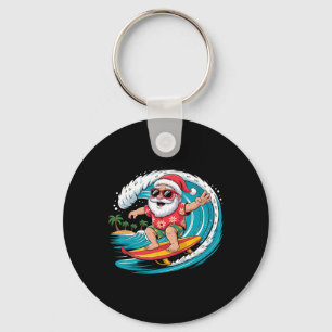 Porte-clés Père Noël surfant sur la plage hawaïenne de Noël e