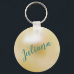 Porte-clés Personalized Ivory White Pearl<br><div class="desc">Create a pretty personalized gift with this keychain that features a pretty pearl illustration in the background in an ivory white or champagne color and your own text in pretty teal. Makes a great party favor or bridesmaid gift.</div>