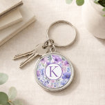 Porte-clés Personalized Monogram Purple Floral Elegant<br><div class="desc">Looking for a thoughtful personalized gift she’ll actually use every day? This custom monogram purple floral keychain is a beautiful and practical gift for birthdays, bridal showers, Mother’s Day, or just because. The elegant purple floral design paired with a personalized monogram creates a stylish accessory that feels both meaningful and...</div>