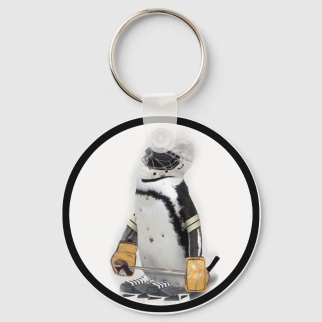 Porte-clés Petit Penguin portant un engin de hockey (Recto)