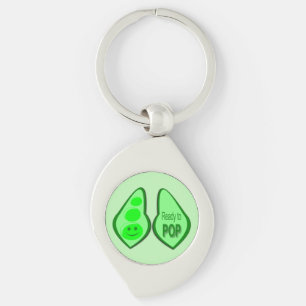 Porte-clés Petit pois vert enceinte prêt à éclore