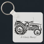 Porte-clés photo vintage Gray massey tracteur fergison<br><div class="desc">La photographie originale de ce vieux tracteur vintage sur ce porte-clés a été prise au Festival de la forêt d'Epping. Le tracteur gris fergison massey sur a été utilisé dans les fermes il y a de nombreuses années. L'image du tracteur capture une image quand les machines agricoles étaient beaucoup plus...</div>