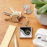 Porte-clés Piano Keys et Gold Music Notes Porte - clé<br><div class="desc">Design musical inhabituel avec touches de piano tourbillonnantes avec notes de musique dorée qui sortent du centre des touches. Cette conception ferait le cadeau parfait pour les amateurs de piano et est disponible sur une collection de cadeaux et de produits en papier.</div>