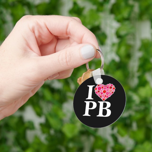 Porte-clés Pickleball plein coeur rose et rouge I coeur PB (main)