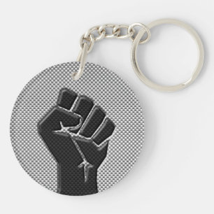 Porte-clés Poing de solidarité en fibre de carbone