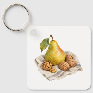 Porte-clés Poire et noix sur un linge