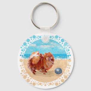 Porte-clés Pomeranian au bord de la mer