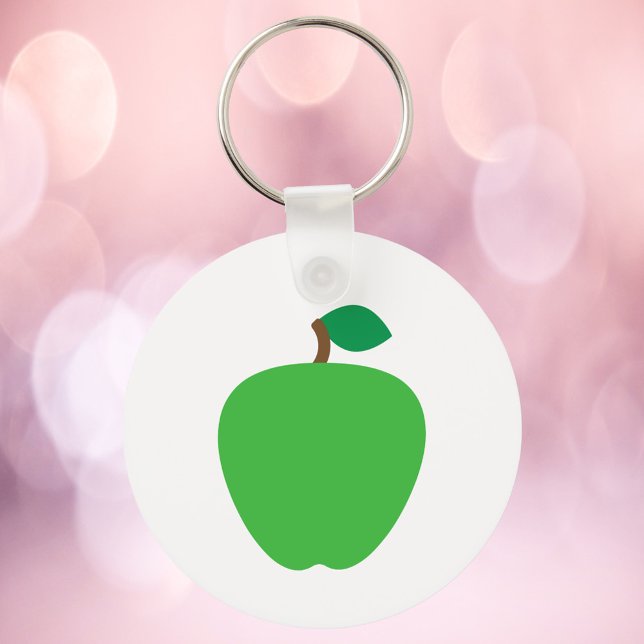 Porte-clés Pomme verte avec feuille (A key chain with a graphic of a green apple)