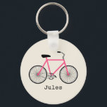 Porte-clés Porte - clé à vélo rose chaud<br><div class="desc">Un porte - clé avec l'illustration d'un vélo rose chaud. Personnalisez avec votre nom sous vélo.</div>