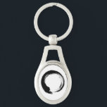 Porte-clés Porte - clé Cercle Zen Enso<br><div class="desc">Zen Spirit & Enso, Zen Circles. Enso est un mot japonais signifiant "cercle" et un concept fortement associé au zen. Il symbolise l'Absolu, l'illumination, la force, l'élégance, l'Univers et le vide ; il peut aussi symboliser l'esthétique japonaise elle-même.</div>