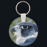 Porte-clés Porte - clé de faucon pèlerin<br><div class="desc">Les faucons pèlerins sont des rapaces de taille de corbeau,  célèbres pour leur vitesse et leur beauté. L'artiste de la faune Kathie Miller a capturé ce magnifique oiseau de proie à l'aide de l'aérographe.</div>
