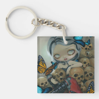 Porte-clés Porte - clé de "papillons et d'os"