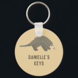 Porte-clés Porte - clé Pangolin personnalisé<br><div class="desc">Gardez vos clés en sécurité avec ce mignon porte - clé pangolin. Il fait le petit cadeau parfait pour quiconque aime les pangolins ou les espèces en voie de disparition. Utilisez le champ modèle pour personnaliser facilement cette clé avec un nom ou un message spécial.</div>