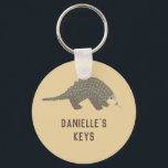 Porte-clés Porte - clé Pangolin personnalisé<br><div class="desc">Gardez vos clés en sécurité avec ce mignon porte - clé pangolin. Il fait le petit cadeau parfait pour quiconque aime les pangolins ou les espèces en voie de disparition. Utilisez le champ modèle pour personnaliser facilement cette clé avec un nom ou un message spécial.</div>