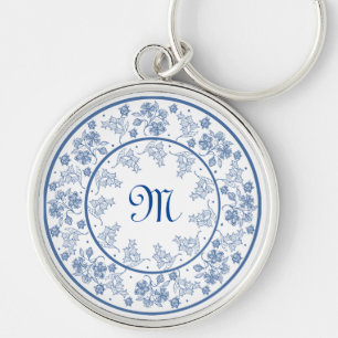 Porte-clés Porte - clé rond à la frontière florale bleu Indig