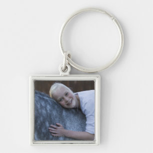 Porte-clés portrait de jeune fille sur le cheval blanc