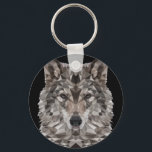 Porte-clés Portrait géométrique du loup gris<br><div class="desc">Ce loup géométrique regarde son défi. Un vrai alpha fidèle à son pack. Elle est dangereuse pour quiconque en dehors de son sac à loups. Le motif géométrique donne à cet animal sauvage et rugueux l'apparence d'un chien domestique, le meilleur ami de l'homme. Mais elle n'est pas apprivoisée, elle est...</div>