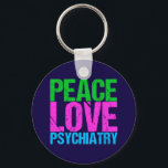 Porte-clés Psychiatre cool<br><div class="desc">Peace Love Psychiatry en lettres de néon brillantes et audacieuses de vert,  rose et bleu. J'adore le domaine de la psychologie et de la médecine se combiner dans ma spécialité,  la psychiatrie. Personnalisez avec les informations de votre psychiatre comme un cadeau.</div>