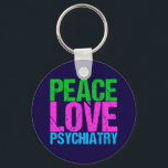 Porte-clés Psychiatre cool<br><div class="desc">Peace Love Psychiatry en lettres de néon brillantes et audacieuses de vert,  rose et bleu. J'adore le domaine de la psychologie et de la médecine se combiner dans ma spécialité,  la psychiatrie. Personnalisez avec les informations de votre psychiatre comme un cadeau.</div>