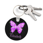 Porte-clés Purple butterfly and stars personalized with name<br><div class="desc">A summery and feminine motive. A butterfly shape filled with shades of purple and shining stars in horizontal stripes.  Black background. Customize and add your name with purple letters.</div>