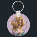 Porte-clés Purple Poodle Dog Floral Whimsical and Cute<br><div class="desc">Introducing the cutest accessory for the ultimate dog lover: our adorable Keychain with a purple printed light brown Poodle on a base of pretty Florals in pink! This keychain is not only functional, but also a sweet and romantic tribute to your best friend. With its watercolor illustration of a cute...</div>