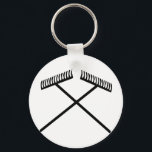 Porte-clés râteau de gazon traversé<br><div class="desc">râteau de gazon traversé</div>