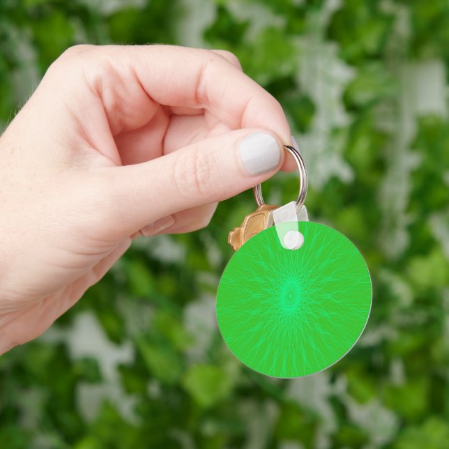 Porte-clés Rayons de mandala bleu sur vert (main)