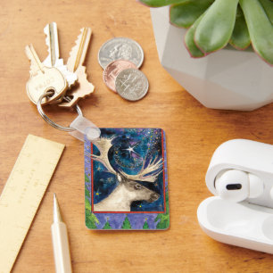 Porte-clés Reinder de Noël à la nuit avec une étoile brillant