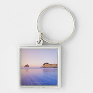 Porte-clés Roche de meule de foin aux vagues bleues de