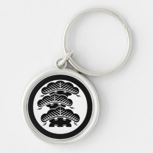 Porte-clés Rond avec pin gauche à trois étages avec branches 