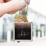 Porte-clés Rose Gold Blush Pink Glitter Glam Monogram Name<br><div class="desc">Glam Rose Gold Glitter Elegant Monogram Keychain Easily personalize this trendy chic keychain design featuring elegant rose gold sparkling glitter on a black background. The design features your handwritten script monogram with pretty swirls and name.</div>