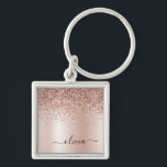 Porte-clés Rose Gold - Blush Pink Glitter Metal Monogram Name<br><div class="desc">Rose Gold - Blush Pink Faux Foil Metallic Sparkle Glitter Brushed Metal Monogram Name Keychains (Key Chain). This makes the perfect sweet 16 birthday, wedding, bridal shower, anniversary, baby shower or bachelorette party gift for someone that loves glam luxury and chic styles.</div>