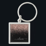 Porte-clés Rose Gold Blush Pink Parties scintillant Script Mo<br><div class="desc">Rose Gold - Blush Pink and Black Sparkle Parties scintillant Script Monogramme Nom Clés (Porte - clé). Cela rend le cadeau parfait pour 16 ans,  mariage,  douche nuptiale,  anniversaire,  baby shower ou bachelorette pour quelqu'un qui aime le luxe glam et les styles chic.</div>