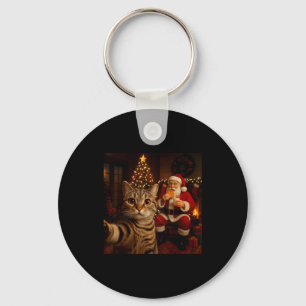 Porte-clés Santa Claus mangeant des cookies de Noël avec un c