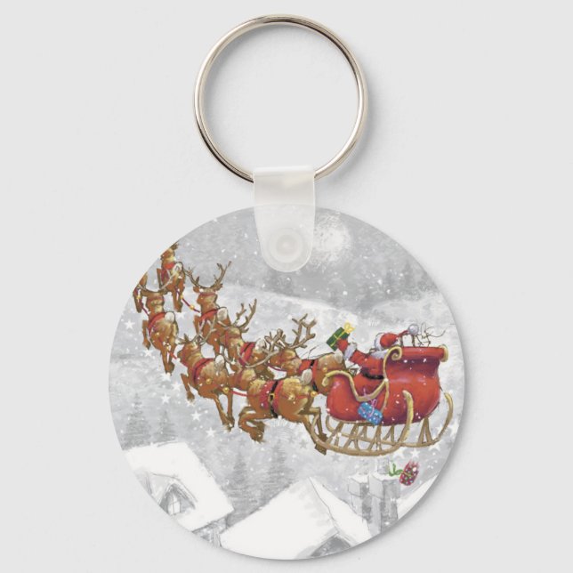 Porte-clés Santa Claus riding on sleigh with gift box (Recto)