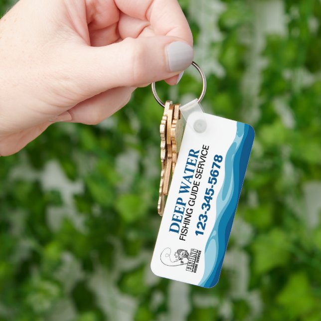 Porte-clés Service de guide de pêche professionnel (main)