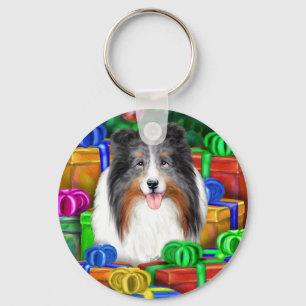Porte-clés Shelter Noël Open Gifts Blue Merle