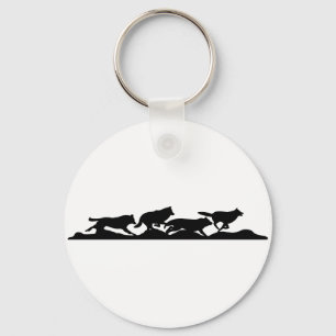 Porte-clés Silhouette de Wolf Noir en course avec le pack