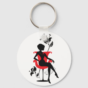 Porte-clés Silhouette graphique d'une femme assise sur une ch
