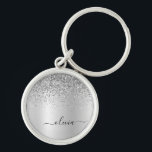 Porte-clés Silver Glitter Glam<br><div class="desc">Argent Faux Foil Parties scintillant à étincelles métalliques brossé Monogramme Nom Clés (Porte - clé). Cela rend le cadeau parfait pour 16 ans, mariage, douche nuptiale, anniversaire, baby shower ou bachelorette pour quelqu'un qui aime le luxe glam et les styles chic.</div>