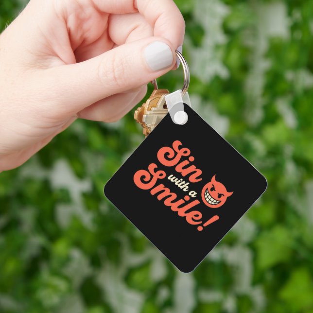 Porte-clés Sin with a Smile (main)