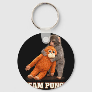 Porte-clés singe adorable coup bébé graphique équipe coup gro