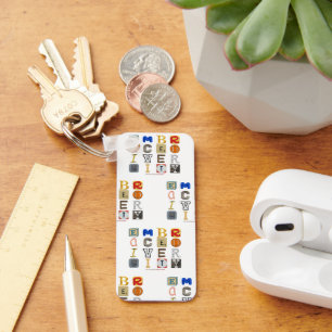 Porte-clés SlipperyJoe's embrasse diversité lettres découpées