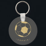 Porte-clés Soccer moderne en noir et or Personnalisé<br><div class="desc">Le joueur de football ou le fan de football de votre vie adorera ces porte-clés personnalisées avec un ballon de football en or. Parfait comme faveur du parti. Coordonnées avec la collection Soccer Star de Parcel Studio. La couleur et le texte de l'Arrière - plan sont personnalisables. *Note : L'or...</div>
