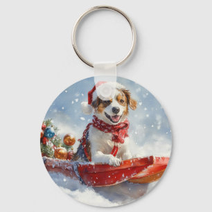 Porte-clés Spaniel Breton dans un traîneau de Noël