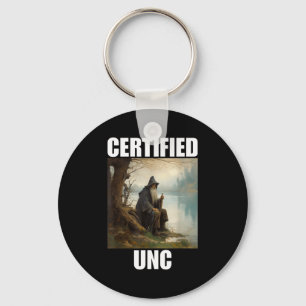 Porte-clés Statut UNC certifié