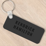 Porte-clés Stylish Trendy Black Out Modern Minimalist Simple<br><div class="desc">A striking black out design with a modern black block typography on an off-black charcoal gray background. The text can easily be customized for a design as unique as you are!</div>