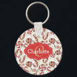 Porte-clés Sucres de canne rétro festifs Motif Monogramme<br><div class="desc">Joli motif vintage de bonbons de Noël avec des bonbons tourbés blancs et rouges et fausse parties scintillant avec un nom personnalisable et monogramme.</div>