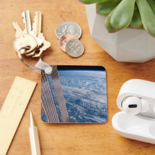 Porte-clés Tasman Et Mer De Corail Recouvertes De Nuages.