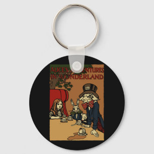Porte-clés Thé à la folie de la couverture Alice vintage